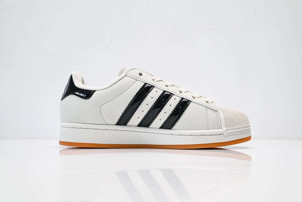 adidas Originals Superstar – Off-White Upper with Black Patent Accents & Gum Sole