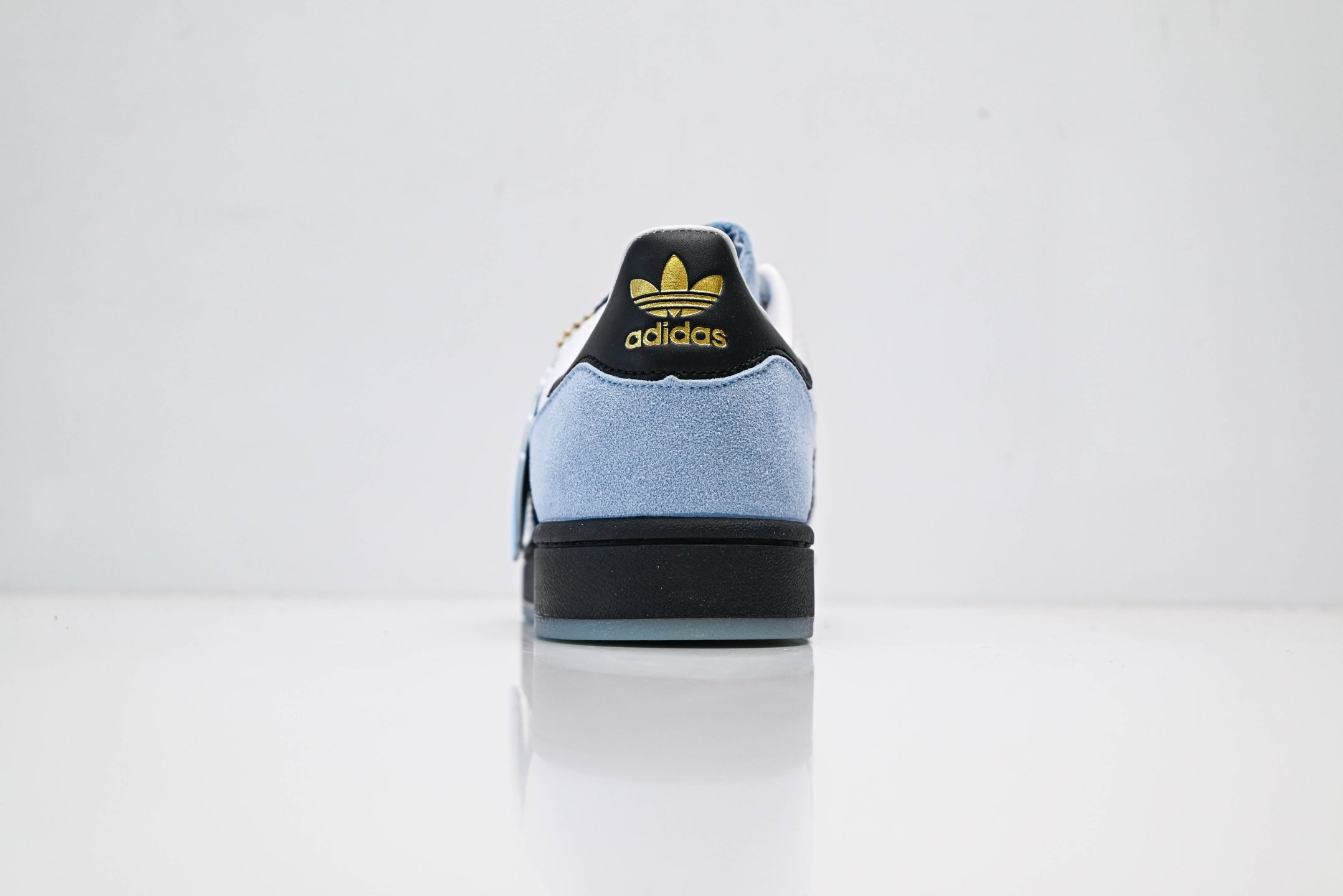 adidas Originals Superstar – Light Blue Upper with White 3-Stripes, Black Heel Tab & Gold Accents